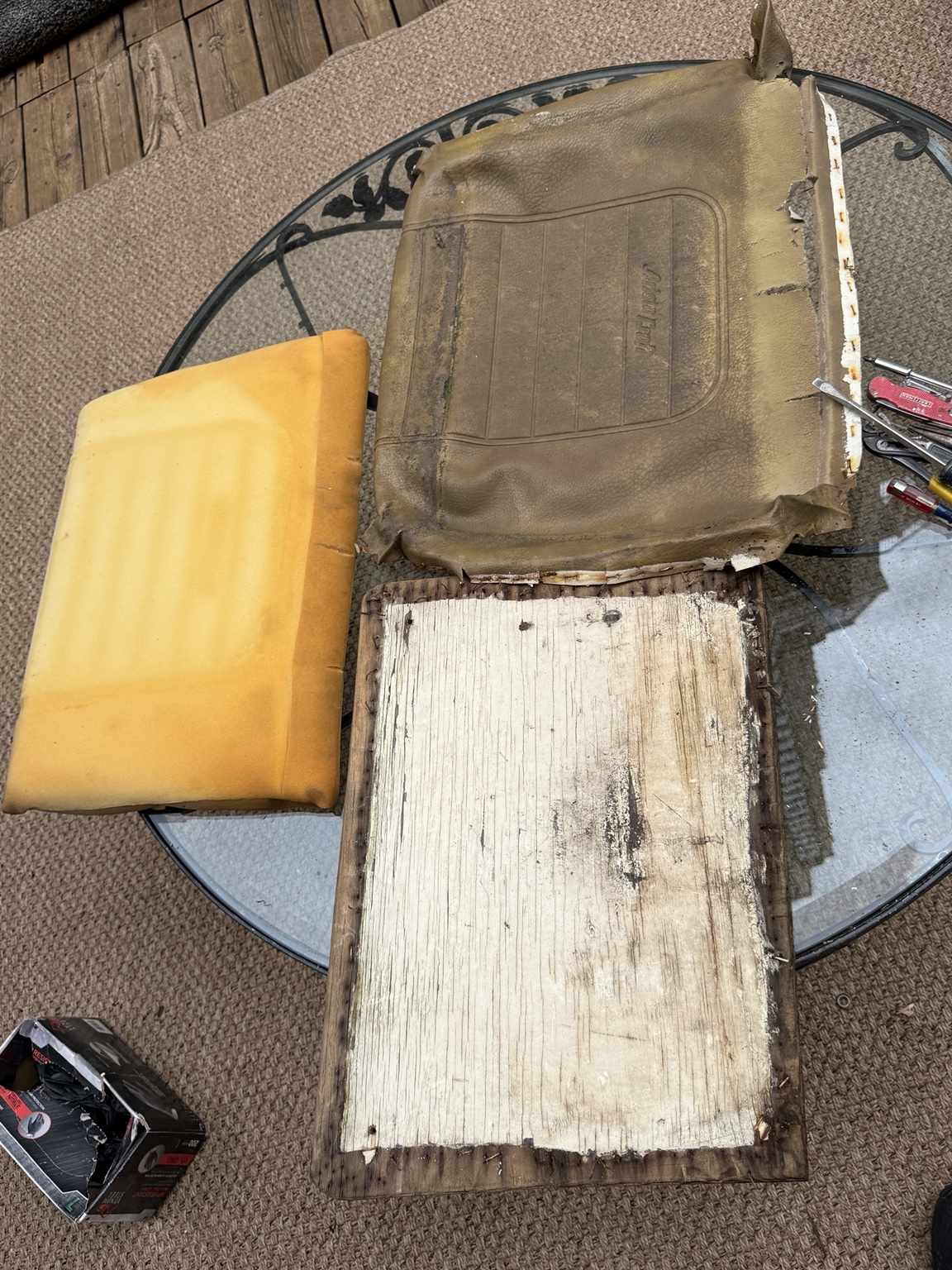 Original Decanter seat pieces being disassembled for restoration